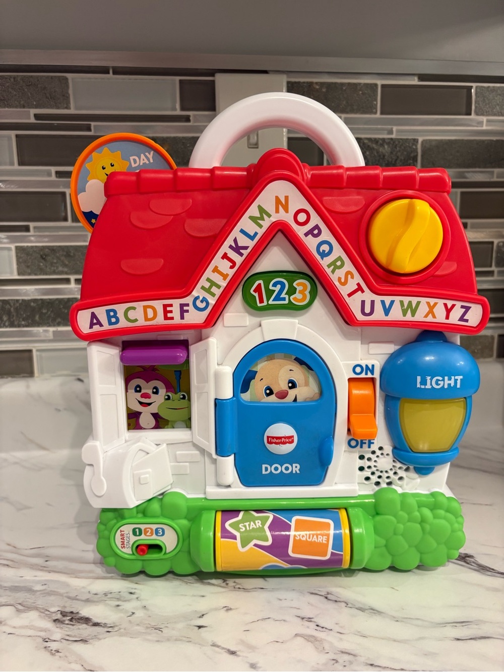 Fisher-Price Laugh & Learn Puppy's Busy Activity Home